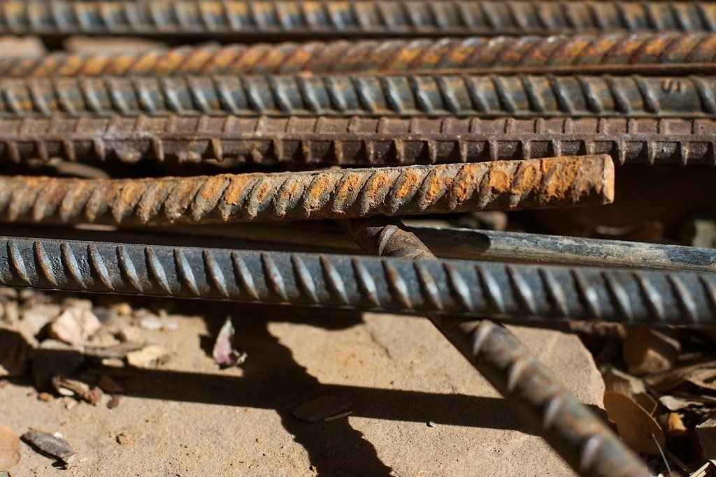 Steel reinforcing bars stacked on a construction site